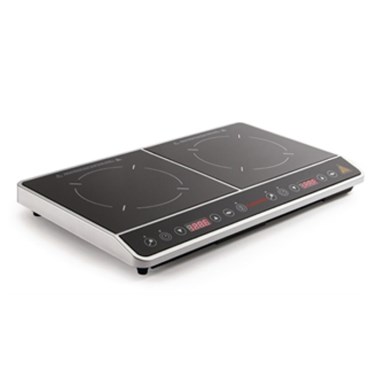 Black and silver double induction cooktop with touch controls and circular heating zones.