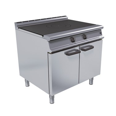 Stainless steel commercial griddle with two control knobs and double cabinet doors underneath.
