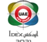 UAE logo featuring red, green, blue, and yellow colours with Arabic text below.