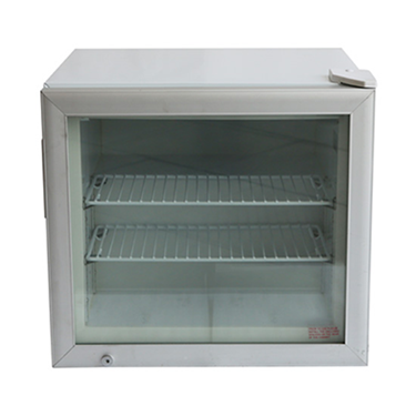 White countertop display freezer with glass front and two metal shelves inside.