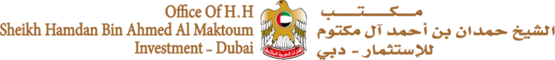 Emblem featuring a golden eagle with a red, green, and black circular design on its chest.