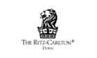 The Ritz-Carlton Dubai logo featuring a lion, black on a white background.
