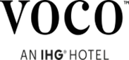 Green and black voco Hotels logo featuring stylised text and a modern design.