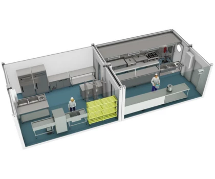 Temporary kitchen layout featuring stainless steel equipment and a blue floor, with two workers present.