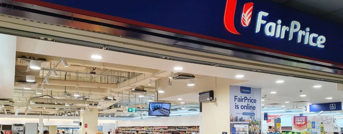 Lowe Rental and FairPrice branding displayed above a well-lit retail space with refrigeration units.