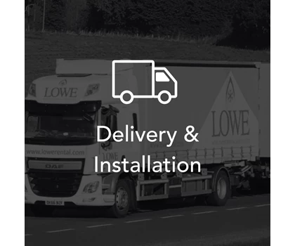 White delivery truck with a logo, set against a blurred green landscape background.