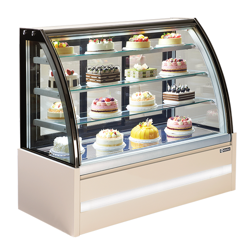 Curved glass patisserie case displaying various colourful cakes on multiple shelves.