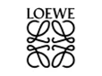 Loewe logo in black against a white background, representing the brand's identity at an event.