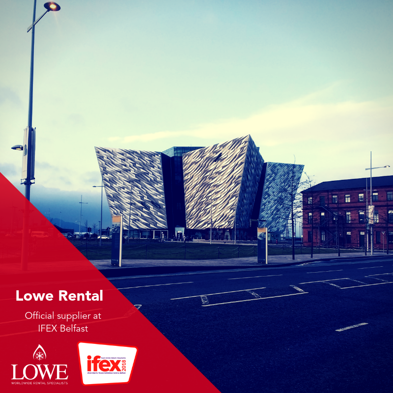 Modern building with a textured silver facade, featuring signage for Lowe Rental at IFEX 2018.