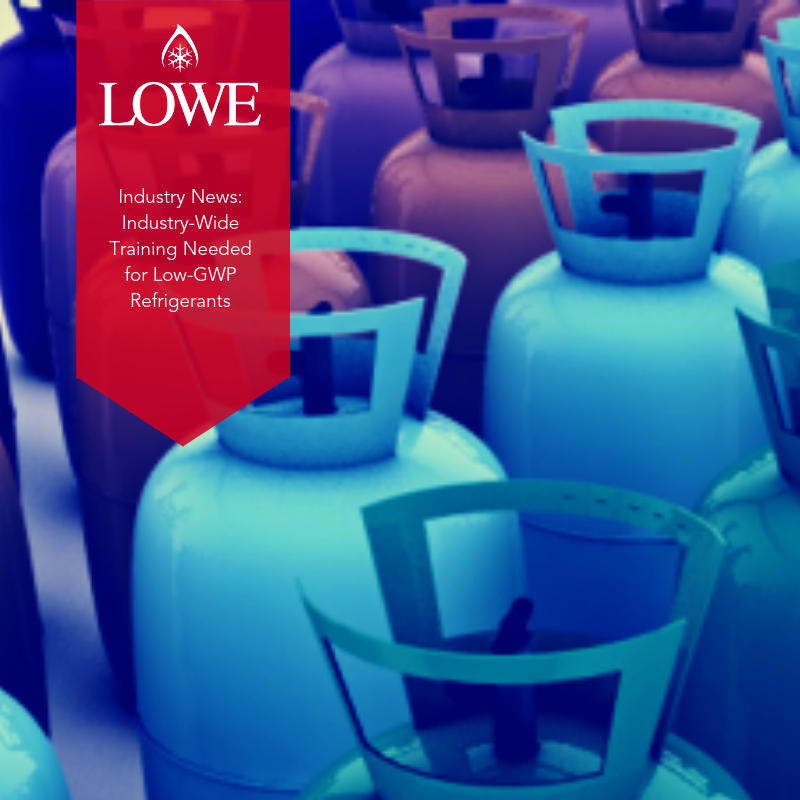 Blue and purple gas cylinders arranged closely, with a red banner featuring the text "LOWE.