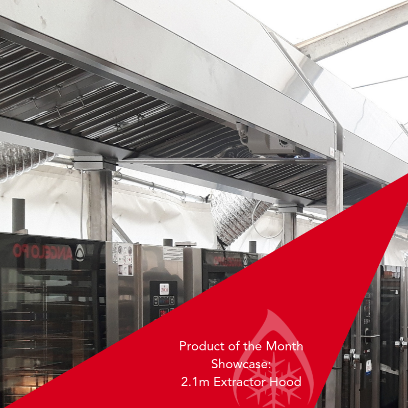 Stainless steel extractor hood showcased under a tent, with a prominent red triangular graphic.