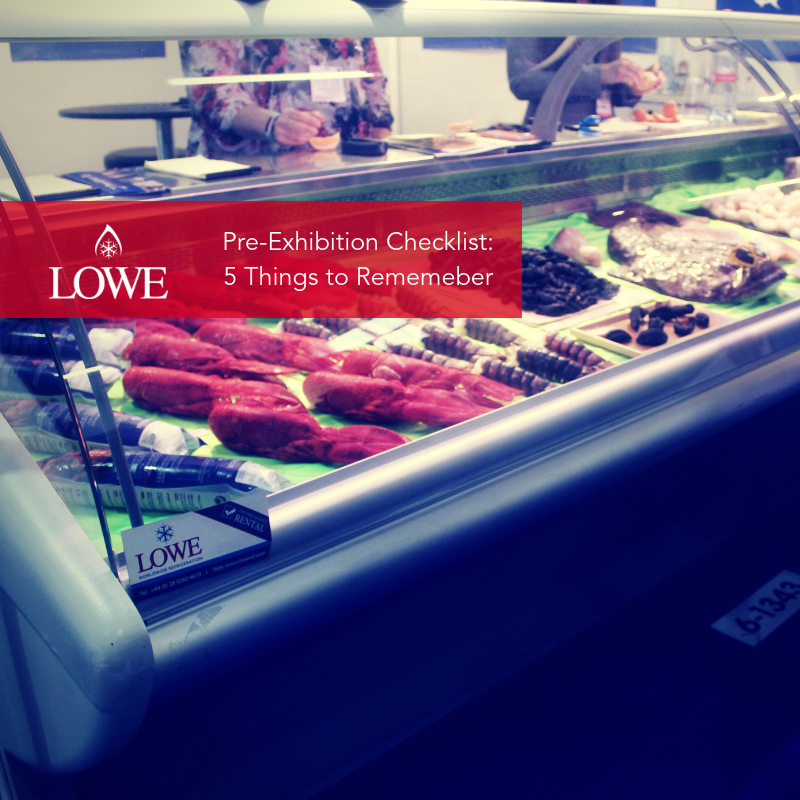 Red and white checklist titled "Pre-Exhibition Checklist" displayed above a variety of meats in a display case.