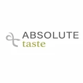 Logo for Absolute Taste featuring grey and green text on a white background.