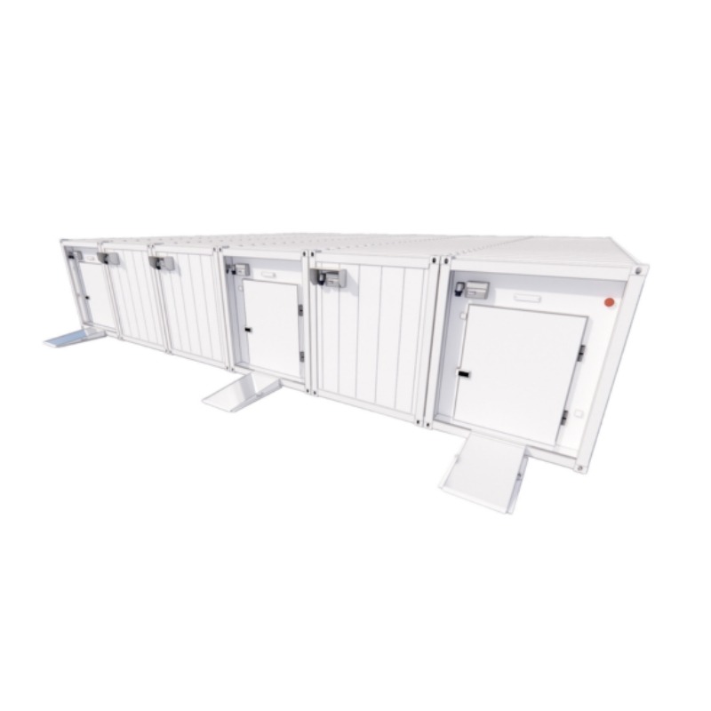 Six-bay cold storage unit with white exterior, featuring multiple access doors and sturdy construction.