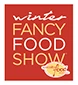 Red promotional banner for the Winter Fancy Food Show, featuring elegant white script text.