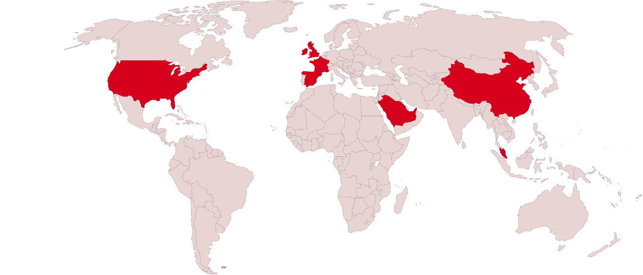 World map highlighting regions in red, with a light pink background and green land areas.