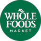 Whole Foods Market logo in green, featuring stylised leaf design above the text.