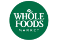 Green circular logo featuring the text "WHOLE FOODS" in bold black letters.